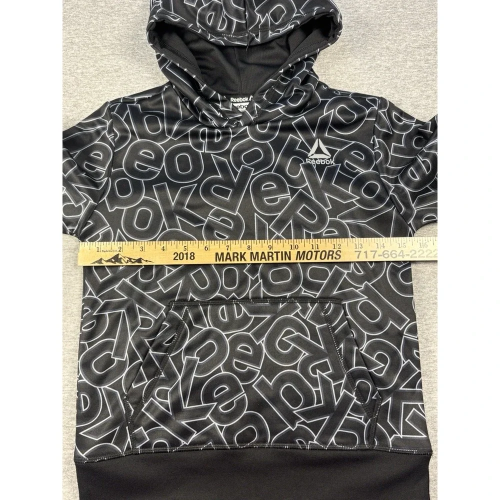 Reebok Boys Hoodie Pullover With All Over Logo Print Black White Size 6/7